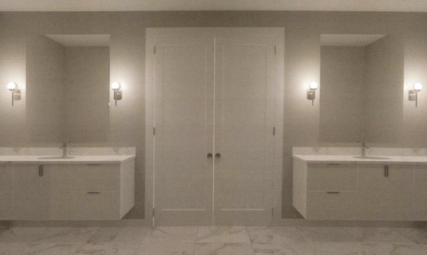 a room with a sink and a mirror